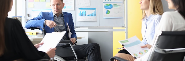 business-coach-wheelchair-conducts-business-meeting-employees-startup-development-concept_151013-26343.jpg